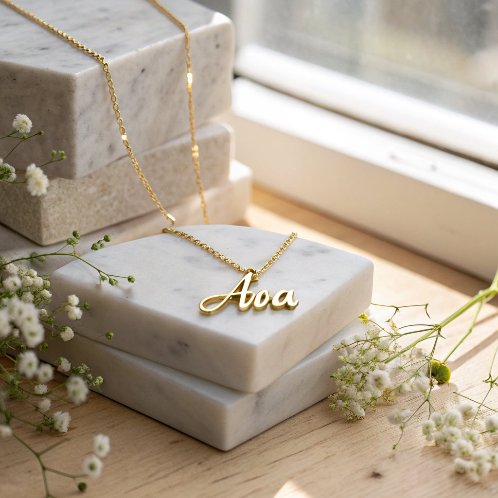 name necklace worn, close-up - Norfloor