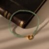 Pearl and Jade-Tone Charm Bracelet - Norfloor