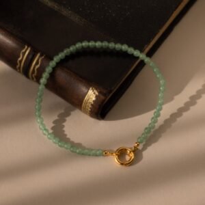 norfloor-pearl-and-jade-tone-charm-bracelet-1 Pearl and Jade-Tone Charm Bracelet - Norfloor